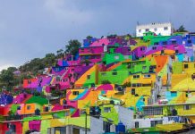 Os artistas de rua colaboram com o governo mexicano para levar um toque de cores vibrantes a um bairro inteiro.