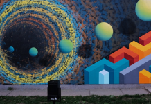 Artista de rua transforma paredes em portais tridimensionais para outro mundo.